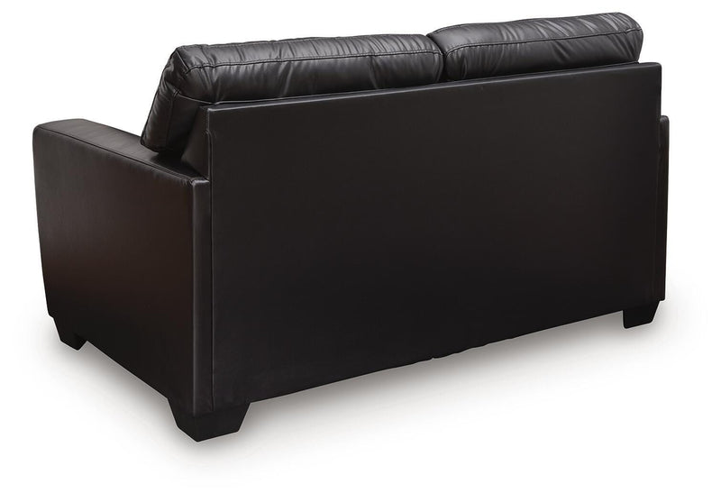 Comfortable Ashley Furniture Glennbre loveseat with plush cushions and modern design, perfect for cozy living room seating.