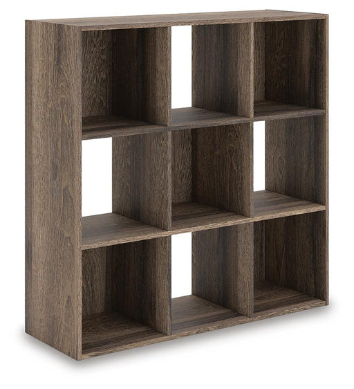 Ashley Furniture Shallifer Nine Cube Organizer with angled view showing nine open storage cubes in a sleek modern design.