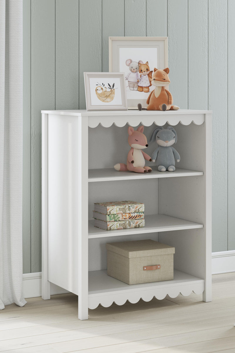 Ashley Furniture Hallityn Bookcase with multiple shelves, wooden finish, and sturdy design for home storage and display.