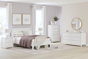 Ashley Furniture Hallityn nightstand with a dark wood finish, featuring a single drawer and open shelf for bedside storage.