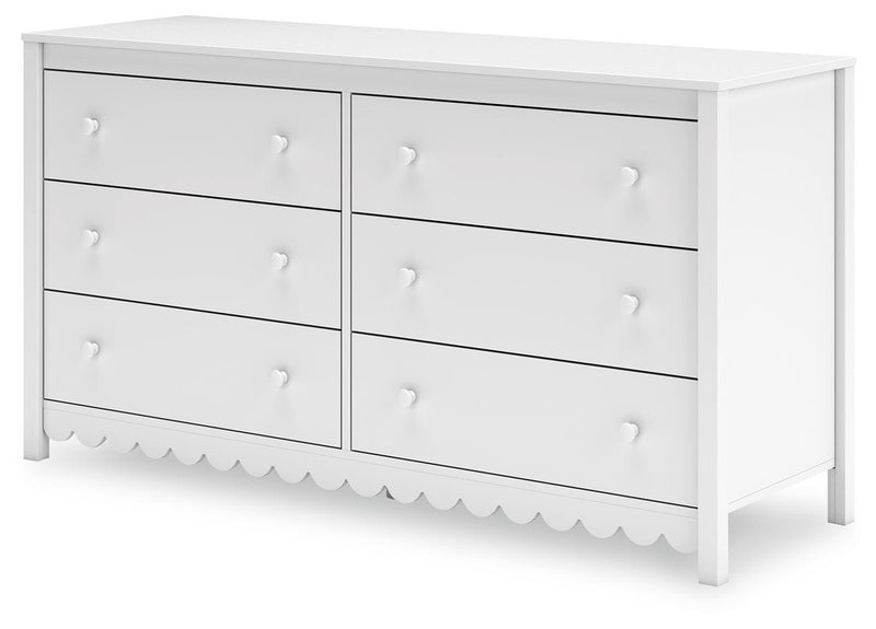 Ashley Furniture Hallityn Dresser with multiple drawers and sleek wood finish, shown from an angled side view.