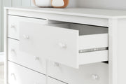 Ashley Furniture Hallityn Dresser with multiple drawers and sleek finish, showcasing its elegant and functional bedroom storage design.