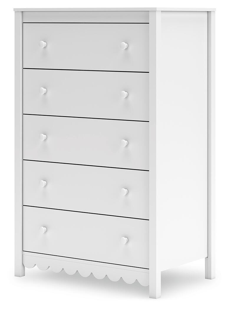 Ashley Furniture Hallityn chest of drawers with a modern wood finish, shown from an angled side view.
