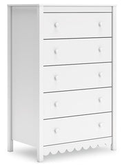 Ashley Furniture Hallityn Chest of Drawers, angled view showing four spacious drawers and sleek wood finish.