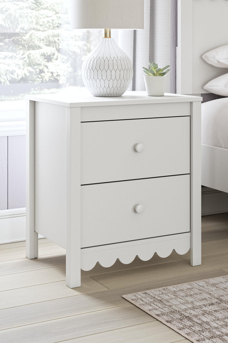 Ashley Furniture Hallityn nightstand with wood finish, featuring a single drawer and open shelf for bedroom storage.