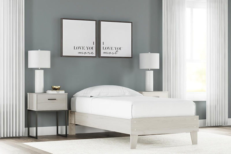 Ashley Furniture Socalle Panel Bed in dark wood finish with sleek headboard and sturdy frame, perfect for a modern bedroom.