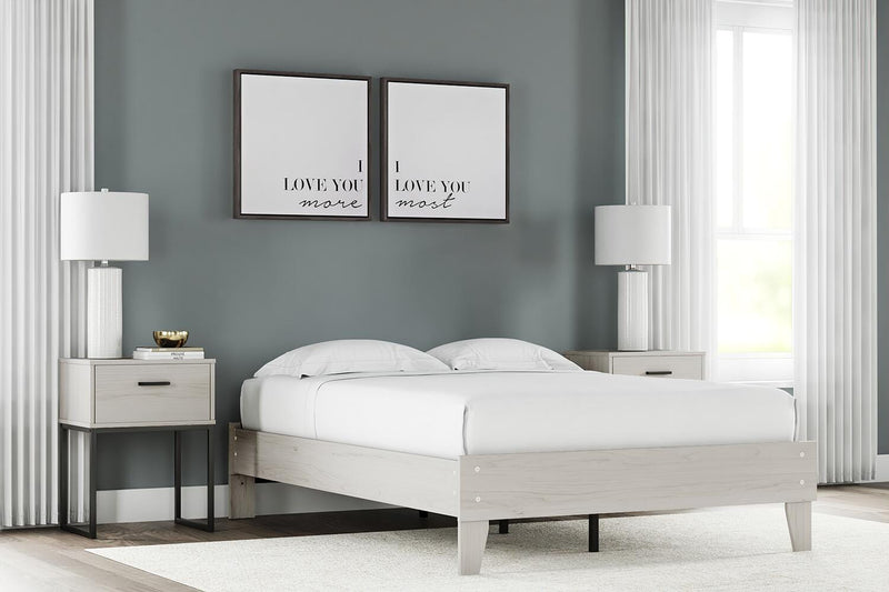 Ashley Furniture Socalle panel bed with a dark wood finish, featuring a sturdy headboard and sleek design for a modern bedroom.