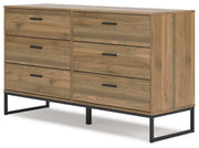 Ashley Furniture Deanlow bedroom set with a modern bed frame, matching nightstands, and coordinated bedroom furniture in a stylish room.