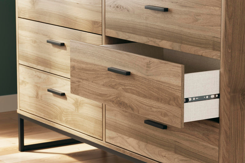 Ashley Furniture Deanlow Dresser with sleek wood finish and multiple drawers for stylish bedroom storage.