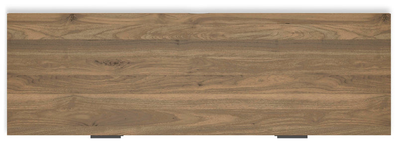 Deanlow Dresser by Ashley Furniture with a sleek wood finish and multiple drawers, shown in a modern bedroom setting.