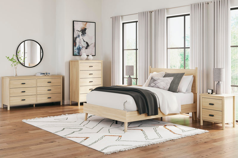 Ashley Furniture Cabinella Dresser with sleek wood finish and modern handles, featuring multiple drawers for ample storage.