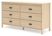 Ashley Furniture Cabinella Dresser with wood finish, featuring multiple drawers and sleek design, shown from an angled side view.