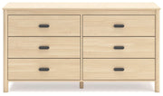Ashley Furniture Cabinella Dresser with sleek wood finish and multiple drawers, shown from the front in a close-up view.