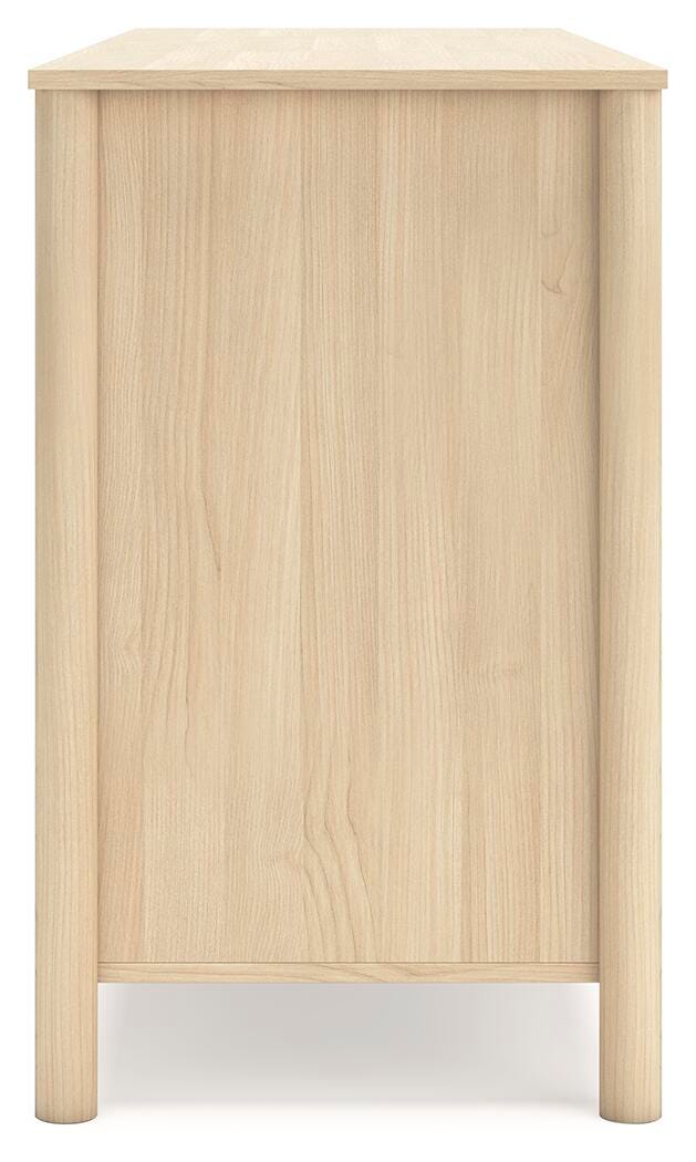 Side view of the Ashley Furniture Cabinella Dresser showing its wooden finish and multiple drawer compartments.
