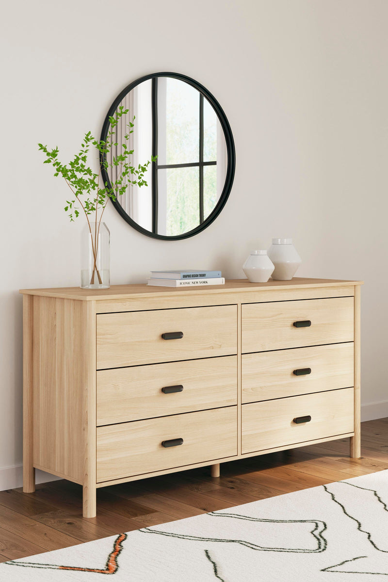 Ashley Furniture Cabinella Dresser with six drawers and modern wood finish, featuring sleek silver handles and clean design.