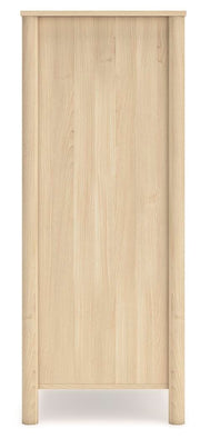 Side view of Ashley Furniture Cabinella Chest of Drawers, showcasing its wooden finish and multiple storage drawers.