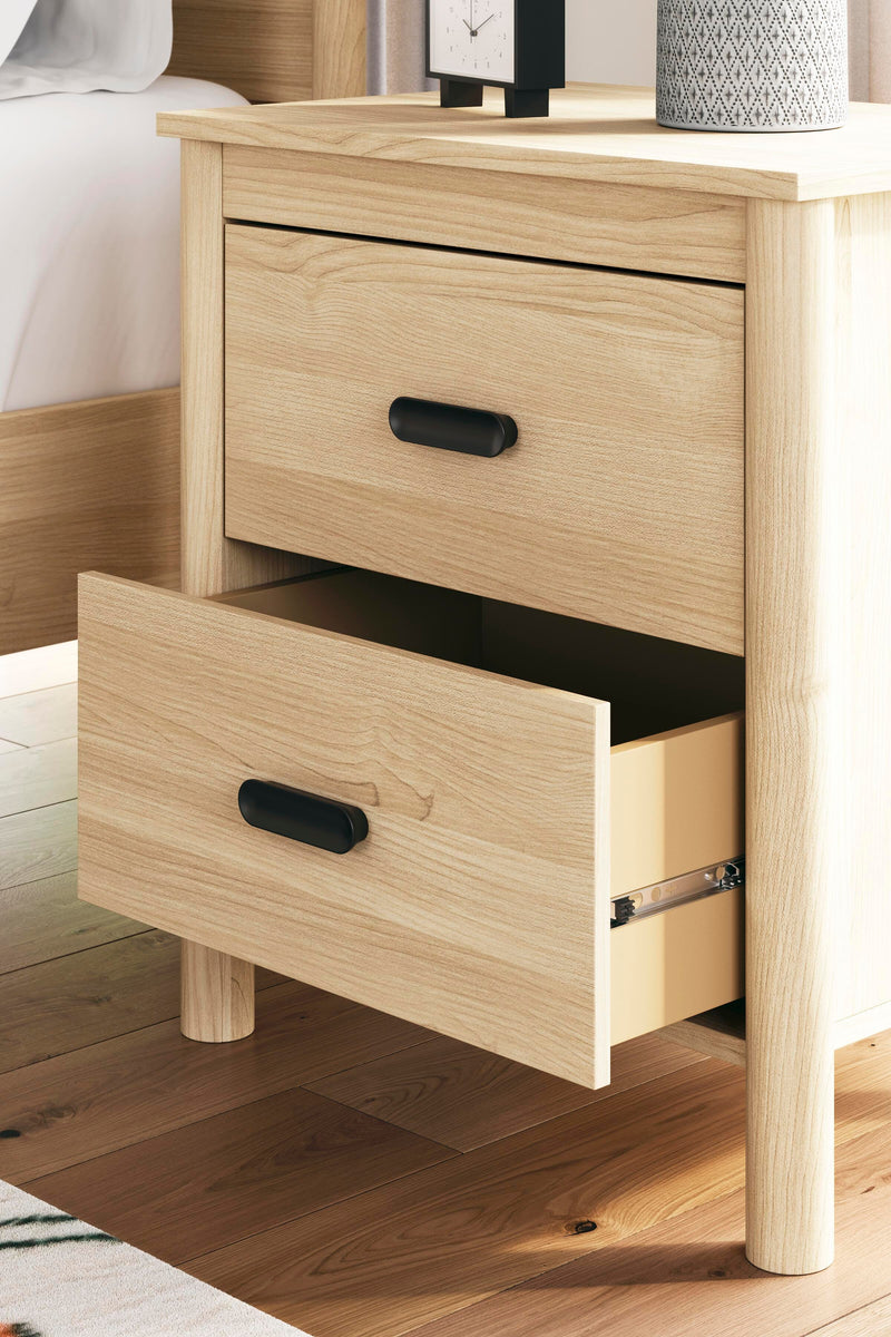 Ashley Furniture Cabinella Nightstand with drawer and open shelf, featuring a warm wood finish and modern design.