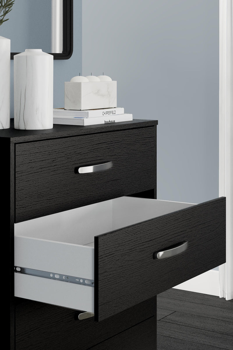Ashley Furniture Finch chest of drawers with sleek wood finish and modern design, featuring multiple spacious drawers.