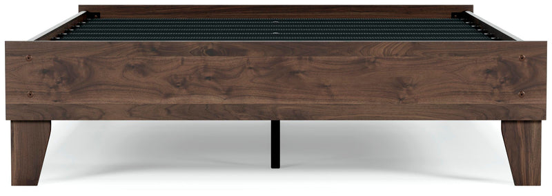 Ashley Furniture Calverson Bed with headboard and dark wood finish, showcasing a modern bedroom furniture piece.