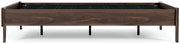 Ashley Furniture Calverson Bed with dark wood finish, showcasing a stylish bedroom bed with side view and detailed headboard design.
