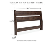 Ashley Furniture Calverson Bed with a wooden frame and upholstered headboard, shown in a modern bedroom setting.