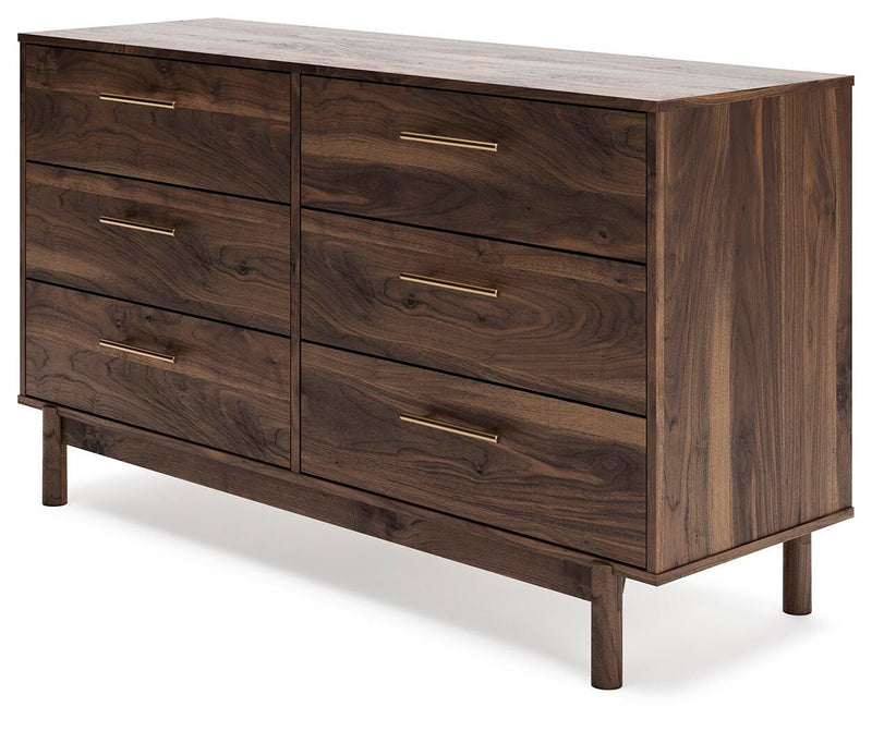 Ashley Furniture Calverson Dresser with multiple drawers and a dark wood finish, shown from an angled side view.