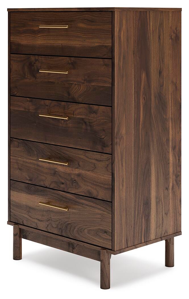 Ashley Furniture Calverson chest of drawers showing a sleek wood finish and modern design from a side angle.