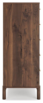 Ashley Furniture Calverson chest of drawers with a dark wood finish and sleek metal handles, shown from a side view.