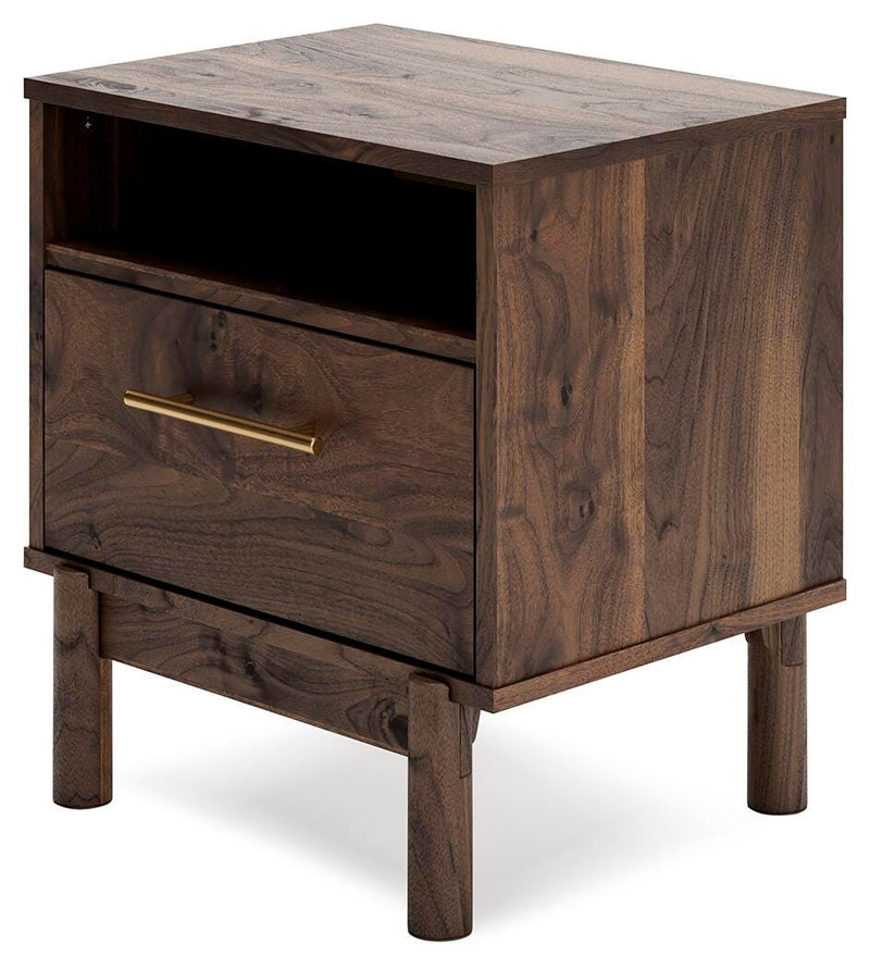 Ashley Furniture Calverson nightstand with a dark wood finish, featuring a drawer and open shelf for bedroom storage.
