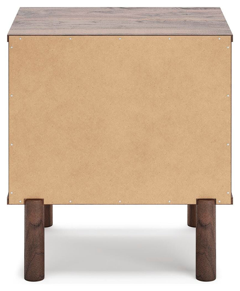 Ashley Furniture Calverson Nightstand with dark wood finish and sleek design, featuring drawer handles and a sturdy top surface.