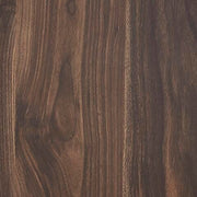 Ashley Furniture Calverson nightstand with a dark finish, featuring a drawer and lower shelf for bedroom storage.