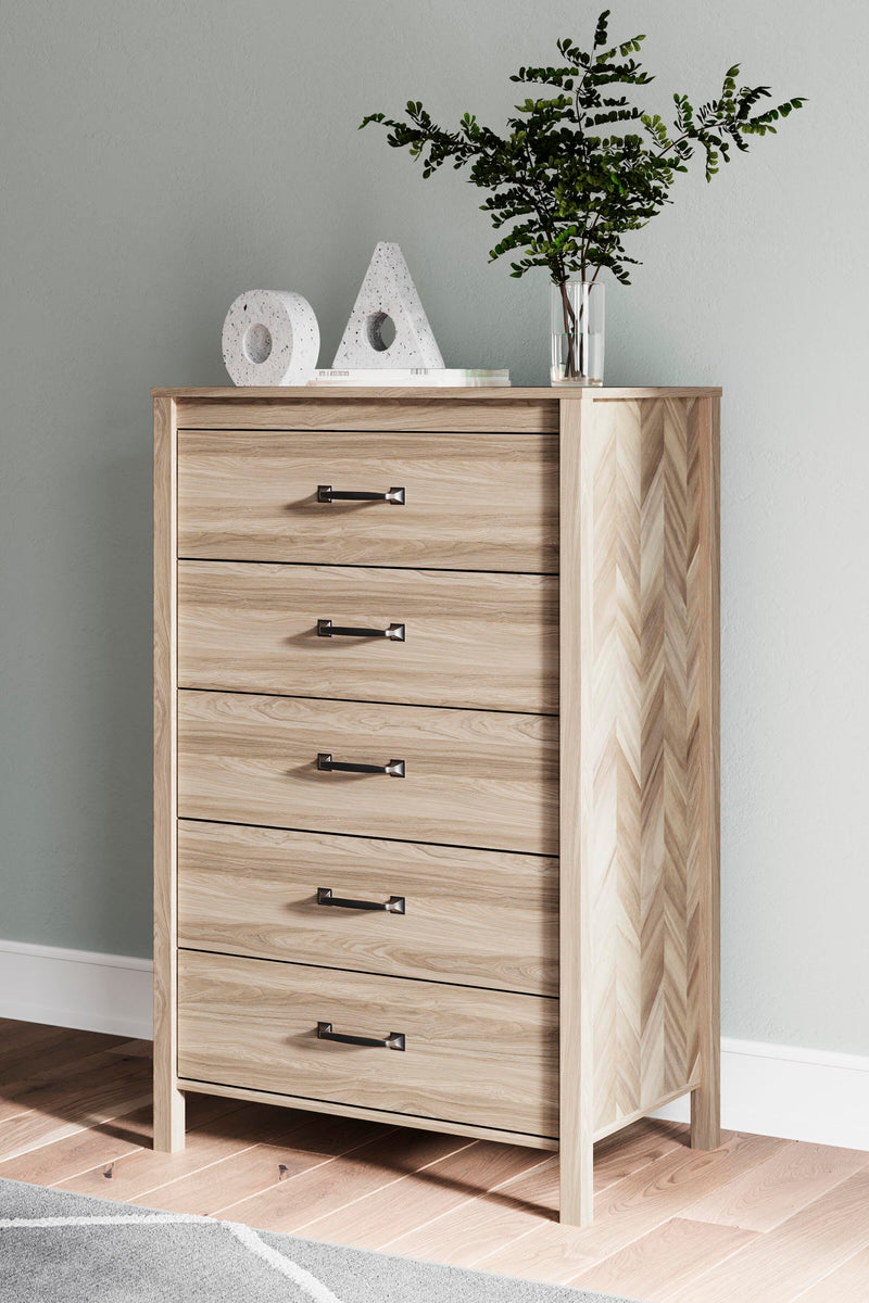 Ashley Furniture Battelle Chest of Drawers with multiple drawers in a modern wood finish, designed for bedroom storage.