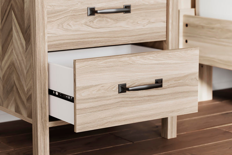 Ashley Furniture Battelle nightstand with a dark wood finish, featuring a single drawer and a spacious top surface.