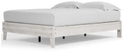 Ashley Furniture Shawburn Queen Platform Bed shown from an angled view with a wooden frame and modern design.