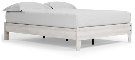 Ashley Furniture Shawburn Queen platform bed with a sleek wooden frame and neutral finish, shown from an angled side view.
