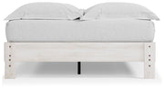 Ashley Furniture Shawburn Queen Platform Bed with a sturdy wooden frame and modern design, shown from the back view.