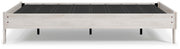 Ashley Furniture Shawburn Queen Platform Bed with a sleek wood frame and modern design, shown from a side angle.