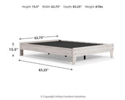 Ashley Furniture Shawburn Queen platform bed with a sleek wood frame and modern design, shown in a well-lit bedroom setting.
