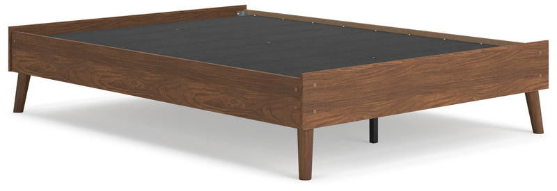 Ashley Furniture Fordmont Bed in a stylish dark wood finish, shown from an angled view highlighting the headboard and frame.