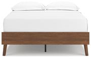 Ashley Furniture Fordmont Bed with a sleek headboard and dark wood finish, shown from a front head-on view.