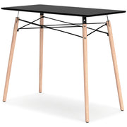 Ashley Furniture Jaspeni home office desk with a sleek wooden surface and modern design, shown from an angled perspective.