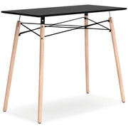 Ashley Furniture Jaspeni home office desk shown from an angled side view, featuring a modern design with a spacious work surface.