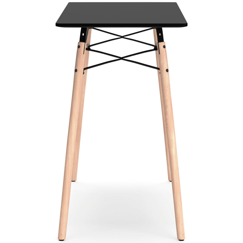 Ashley Furniture Jaspeni home office desk with a sleek wooden surface and modern design, shown from a side angle.
