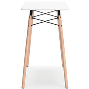 Ashley Furniture Jaspeni home office desk shown from the side, featuring a sleek wood finish and modern design for workspace comfort.
