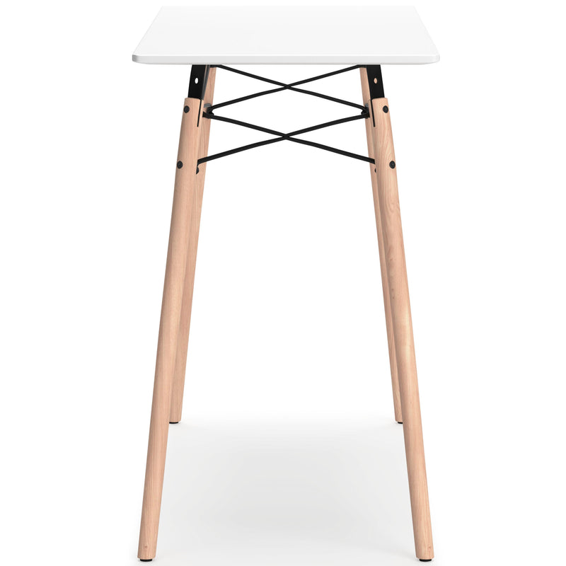Ashley Furniture Jaspeni home office desk shown from the side, featuring a sleek wood finish and modern design for workspace comfort.