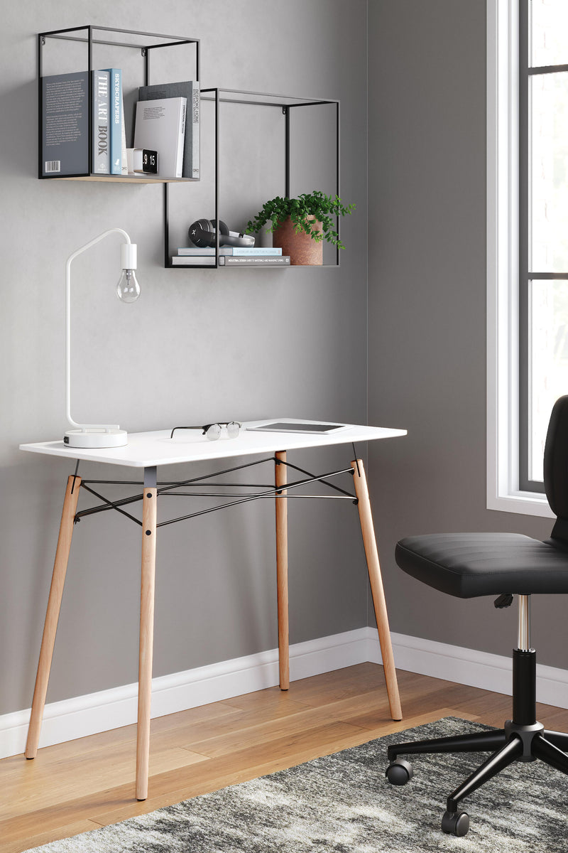 Ashley Furniture Jaspeni home office desk with a spacious surface and modern design, ideal for workspace organization.