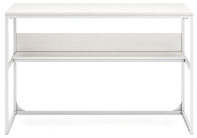 Ashley Furniture Deznee home office desk shown from a head-on angle, featuring a spacious work surface and modern design.