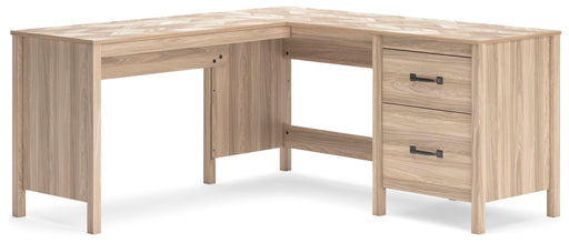 Ashley Furniture Battelle 60-inch home office desk with return, featuring a sleek wood finish and modern design, shown at an angle.