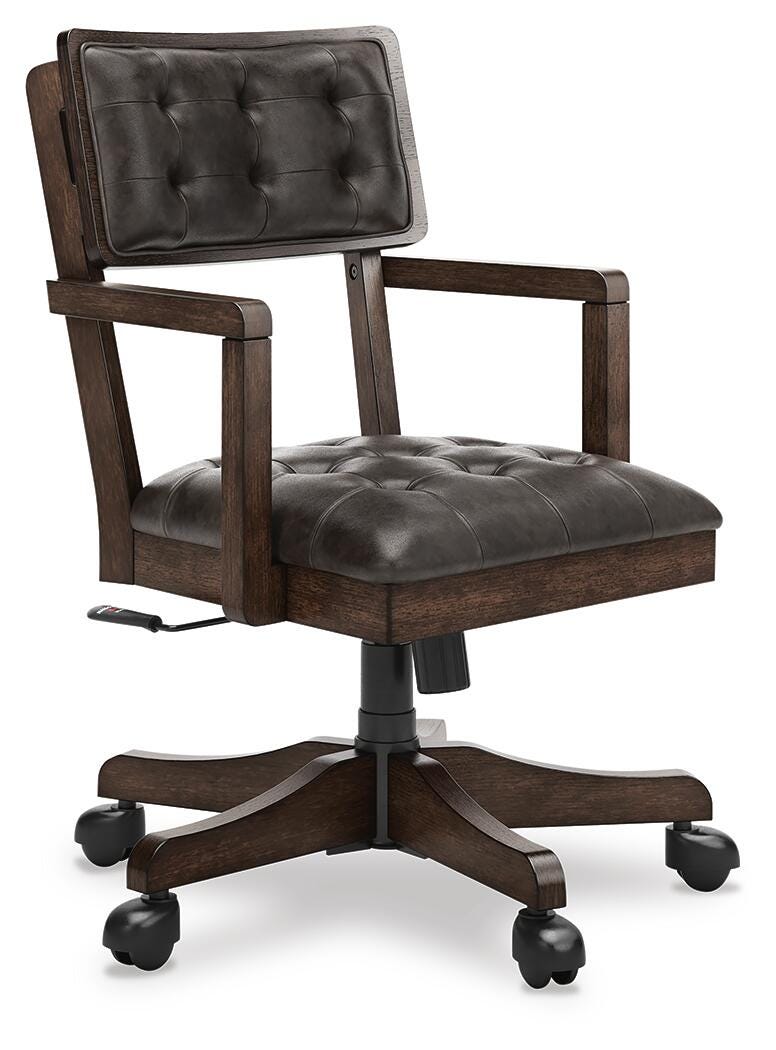 Ashley Furniture Breckington Home Office Set shown from an angled view, includes desk and matching storage pieces in a modern style.