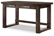 Ashley Furniture Breckington home office set with a wooden desk, hutch, and matching chair in a cozy workspace setting.